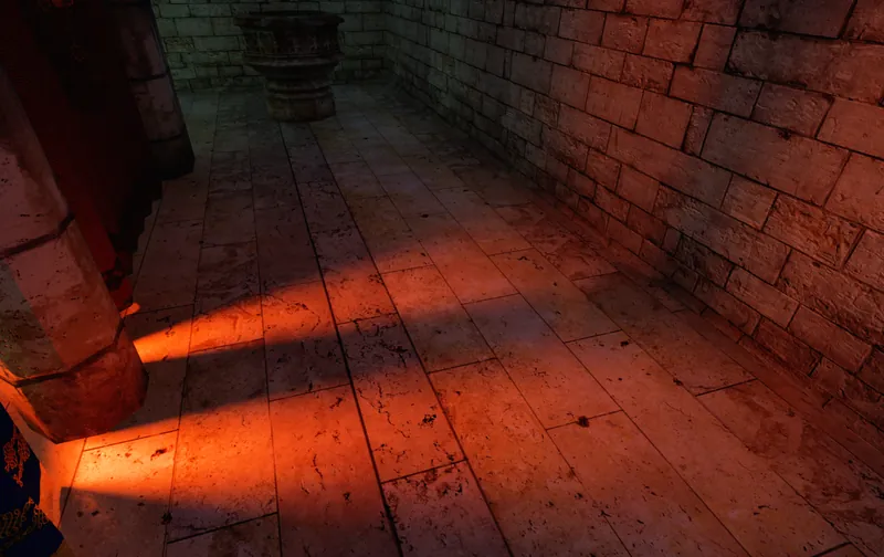 ReSTIR direct lighting: red light casting long column shadows across cracked stone tiles